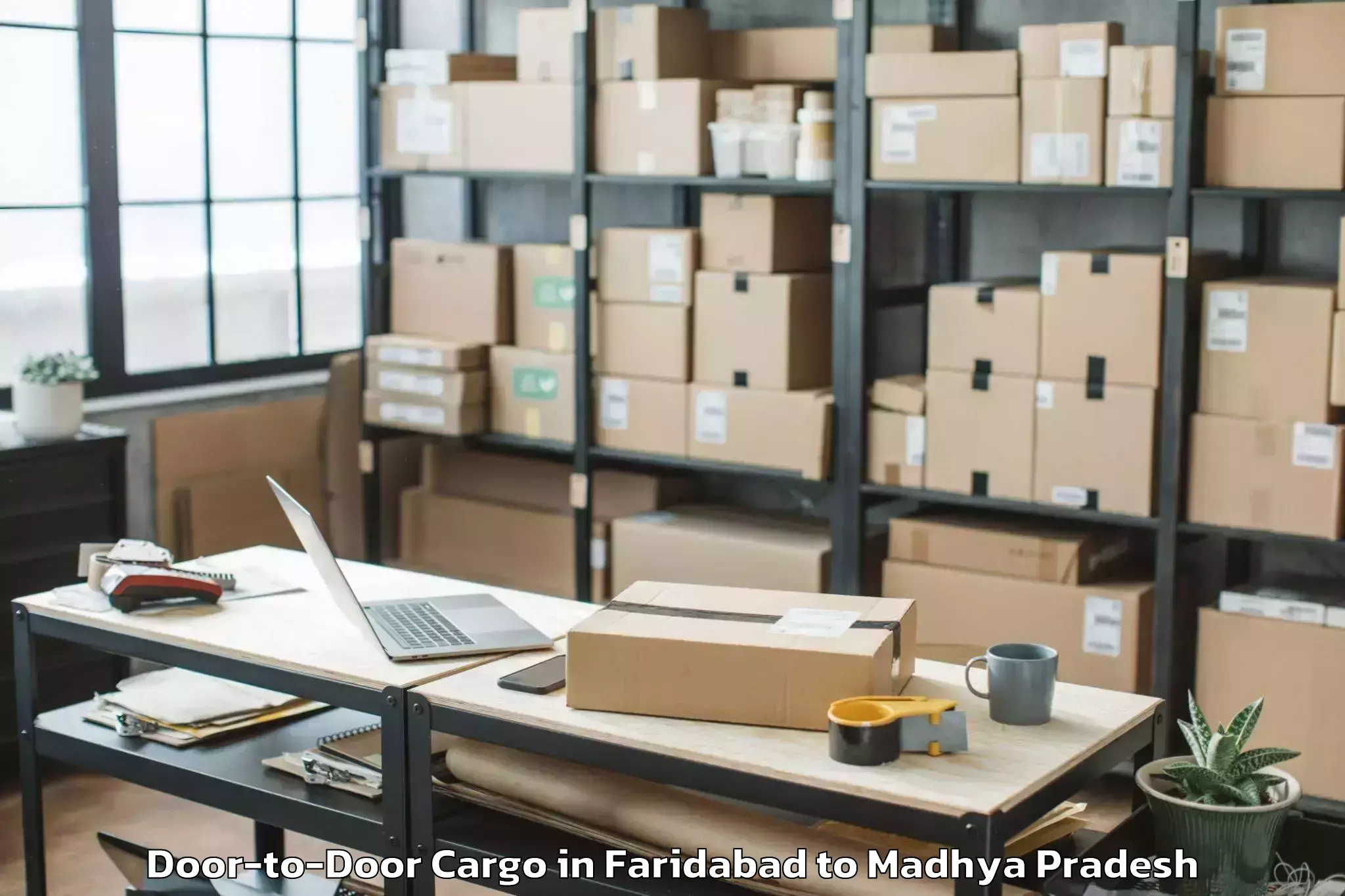 Book Faridabad to Iit Indore Door To Door Cargo Online